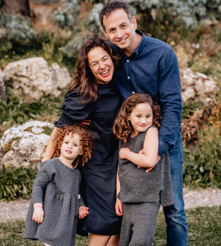 family of four, outdoor picture, mother, father, and two daughters 