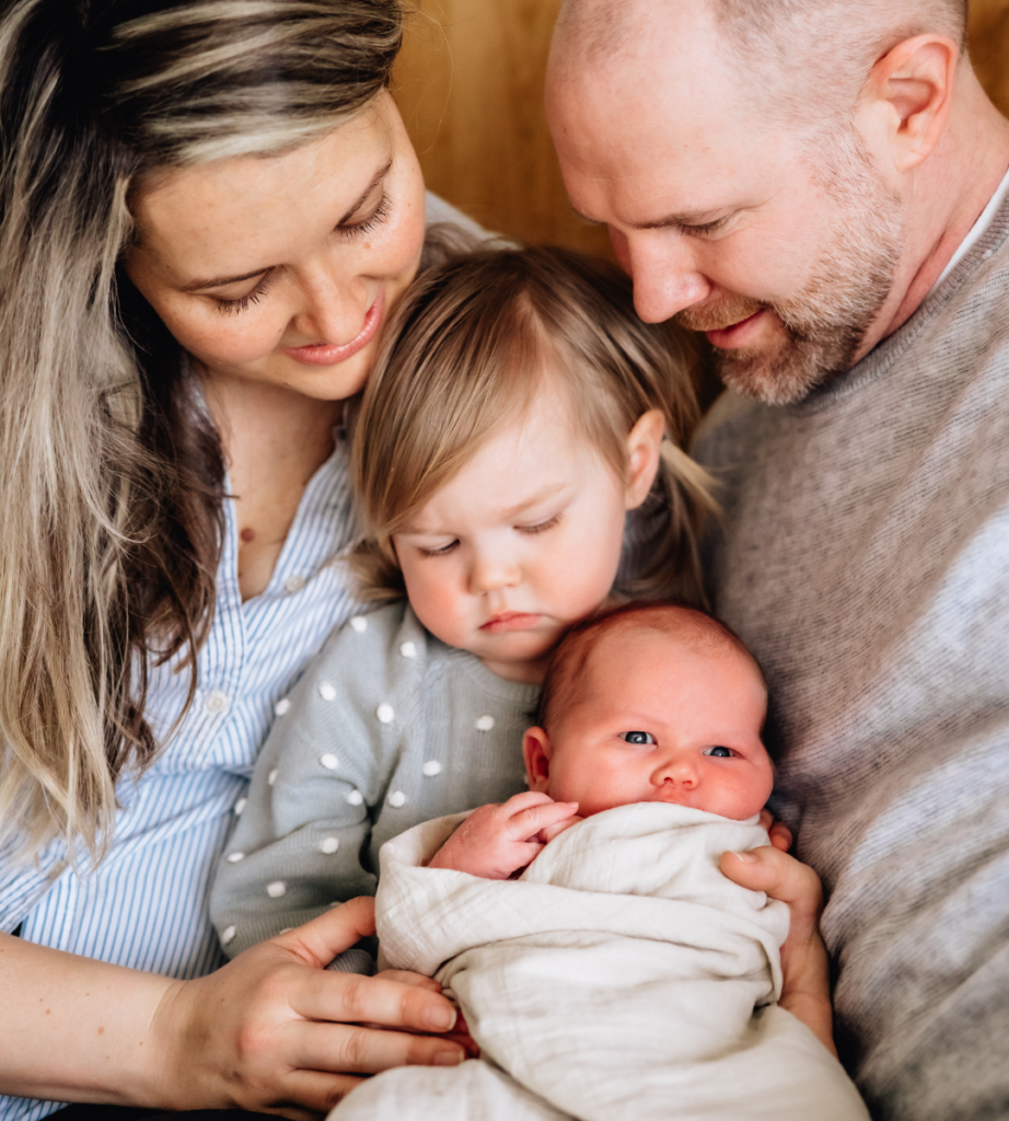 close up of a mother, father, and two children 