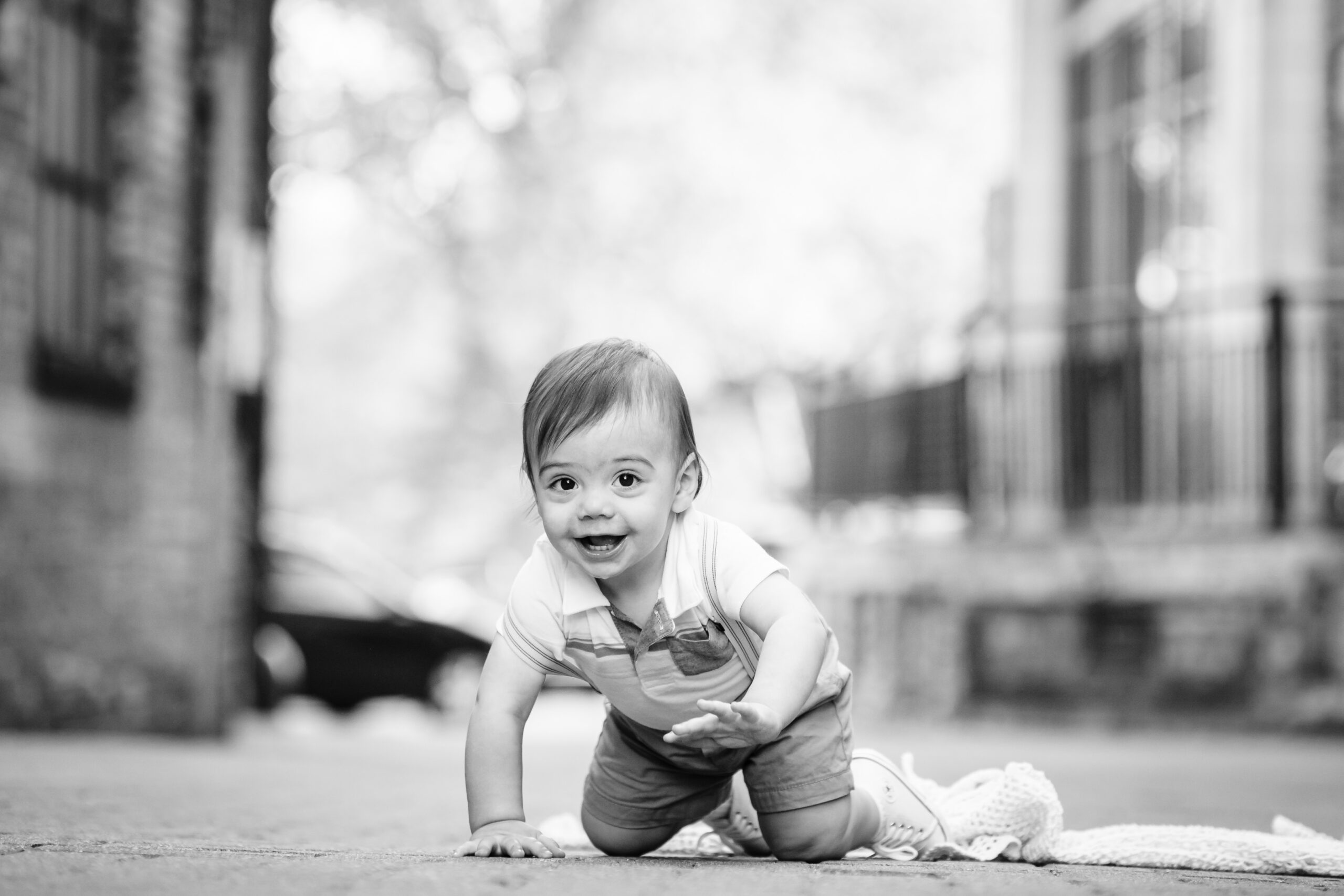 young toddler crawling towards the camera